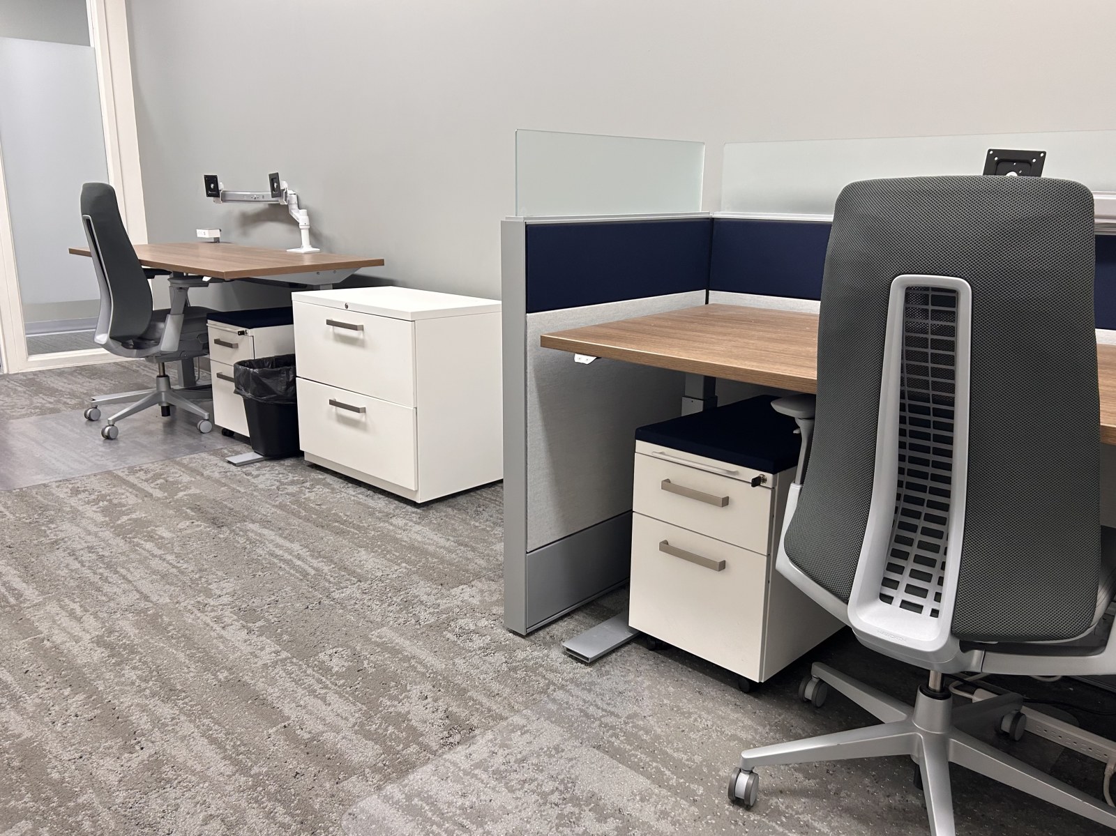 Several workstations sharing one private room at Intelligent Office Tucson