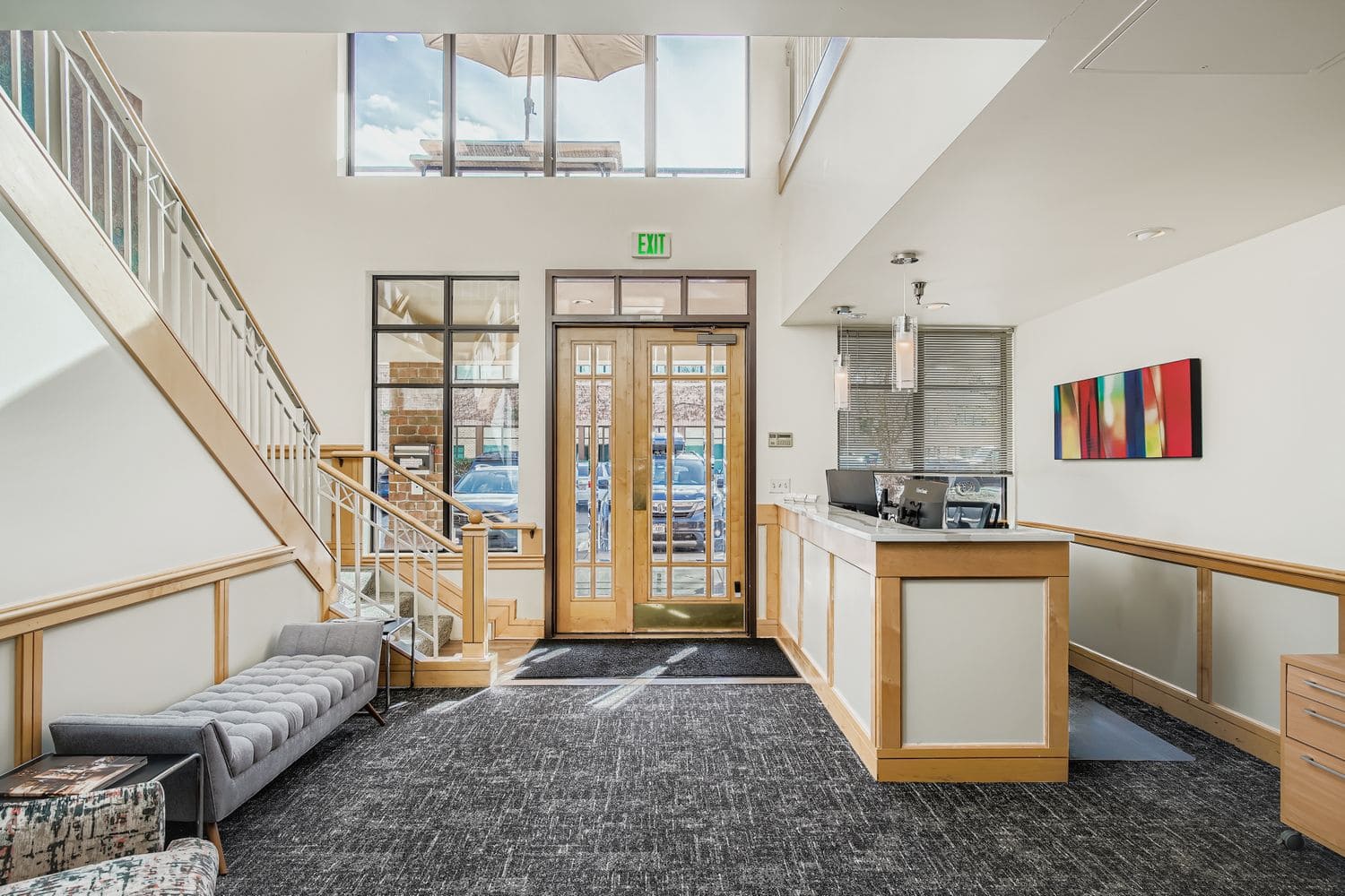 Modern smart office reception area with natural light and contemporary decor.