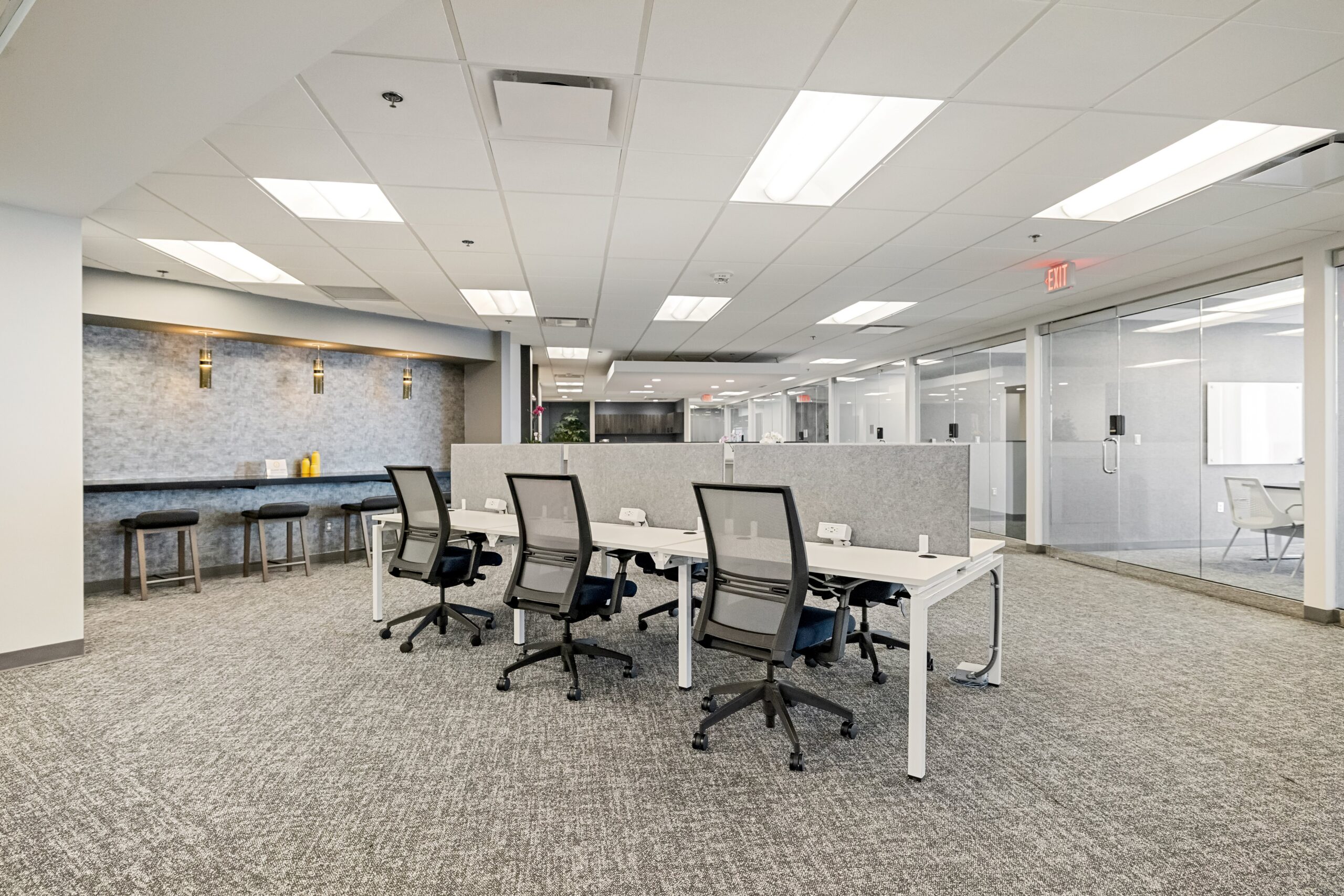 Flexible office workspace with modern furniture and collaborative areas at Intelligent Office.