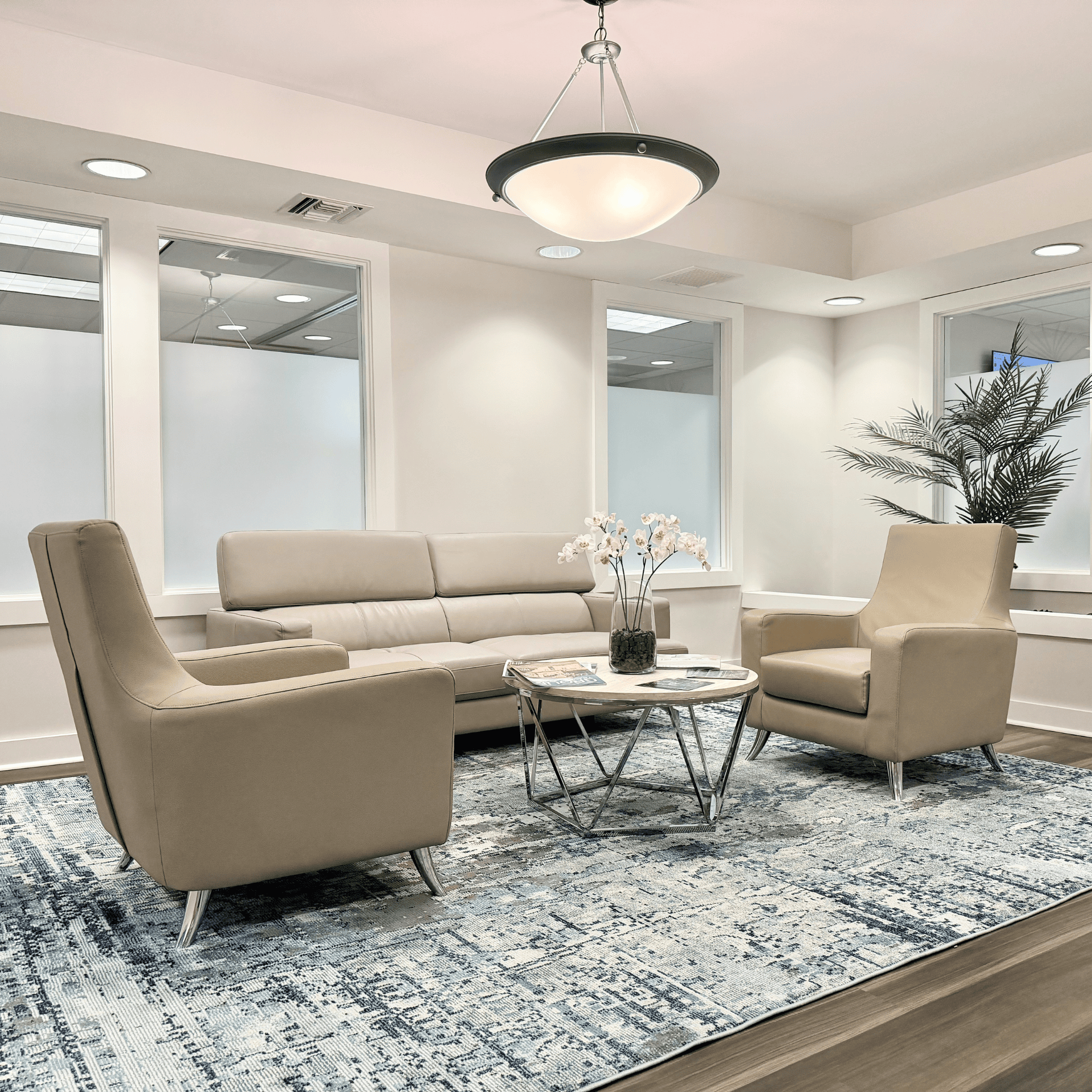 Relaxing modern office lounge with comfortable seating and stylish decor at Intelligent Office.