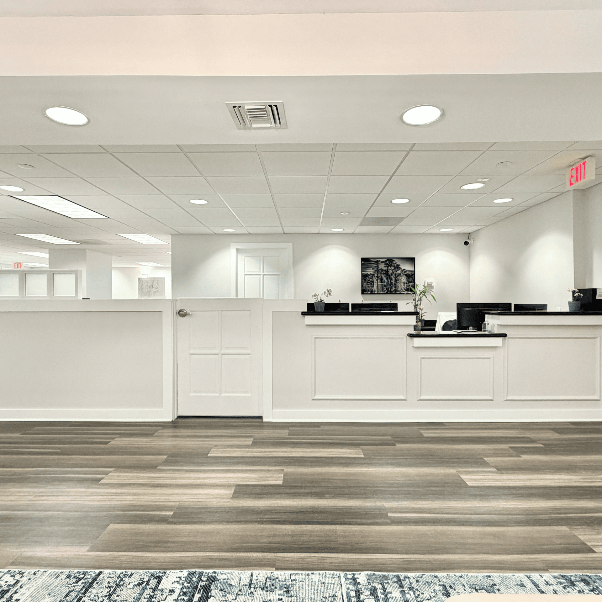 A professional, clean reception desk in a contemporary office space.