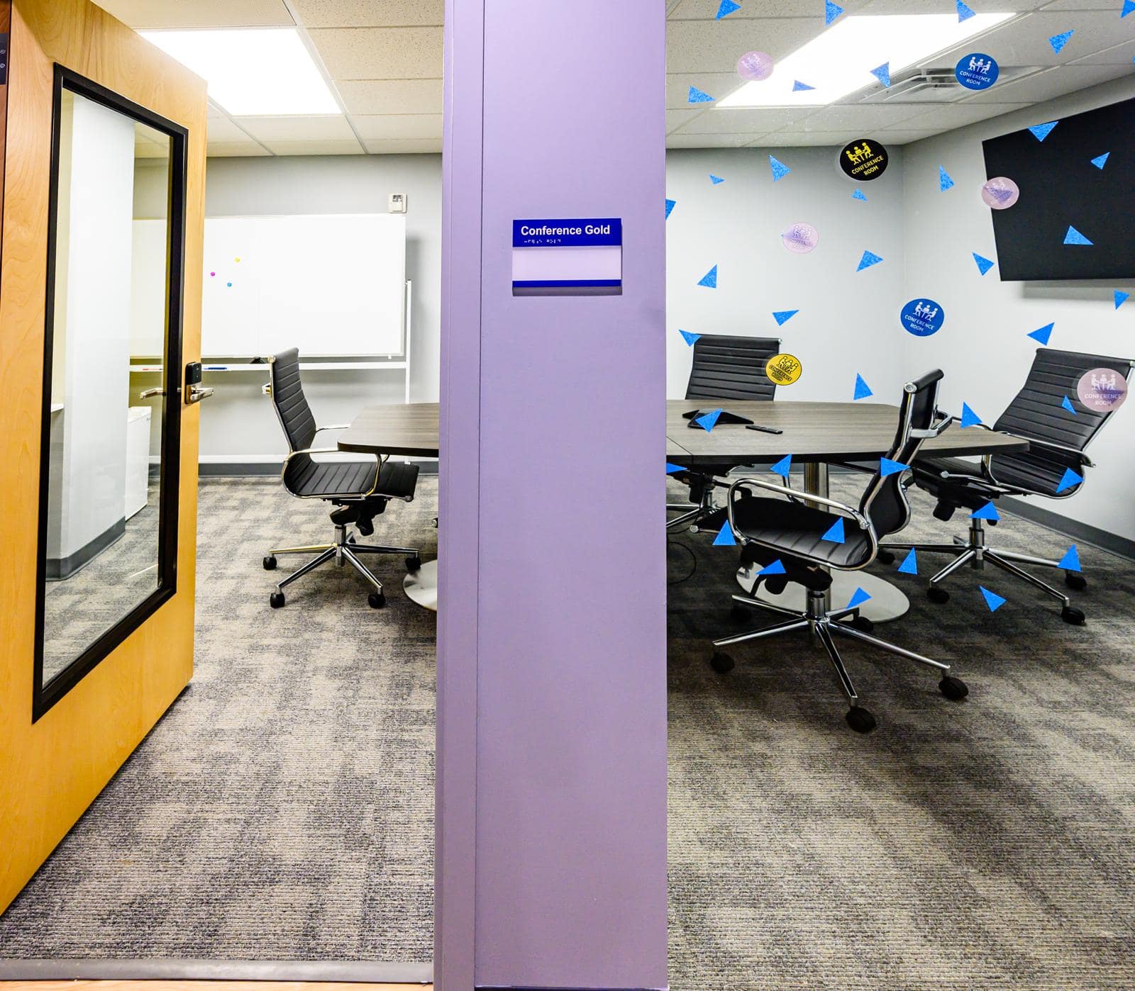 Conference Room at Intelligent Office with modern seating and decor.